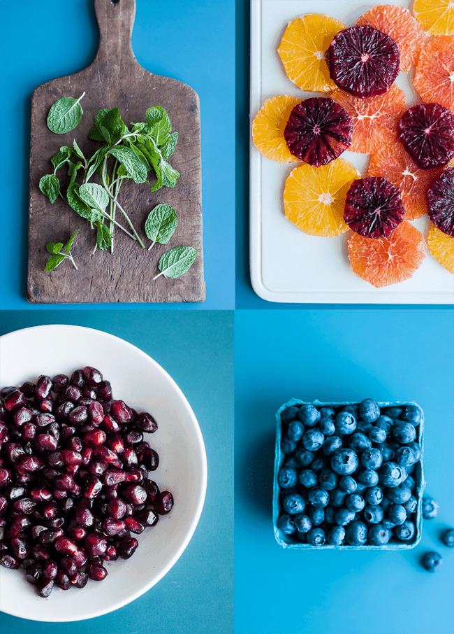 Baby Kale Salad with Oranges, Blueberries and Pomegranate | HelloGlow.co