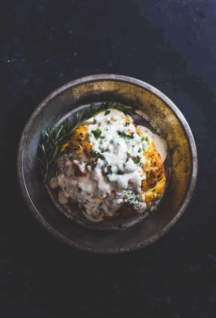 Whole Roasted Cauliflower with Fontina Cheese Sauce from Heartbeet Kitchen
