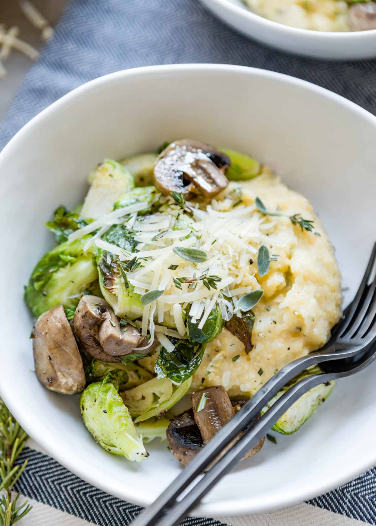 Herbed Parmesan Polenta with Crispy Brussels Sprouts and Mushrooms from Hello Veggie