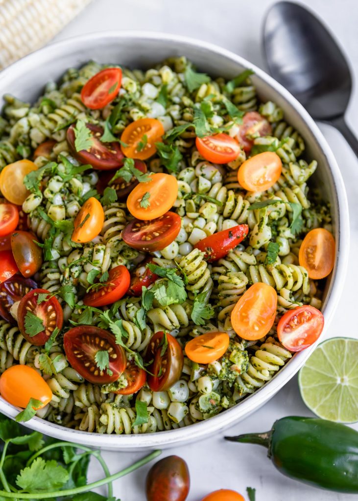 Jalepeno Cilantro Pesto Rotini with Corn and Grape Tomatoes | HelloVeggie.co