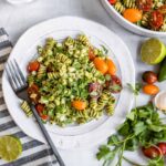 Jalepeno Cilantro Pesto Rotini with Corn and Grape Tomatoes | HelloVeggie.co