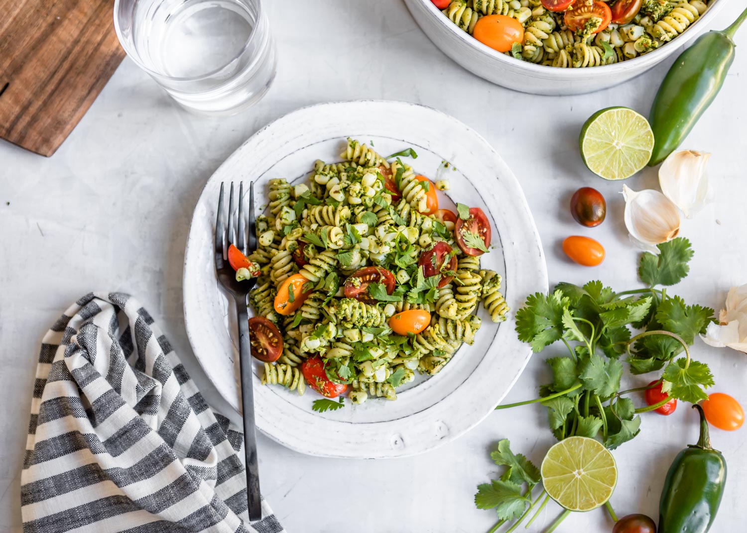 Jalepeno Cilantro Pesto Rotini with Corn and Grape Tomatoes | HelloVeggie.co