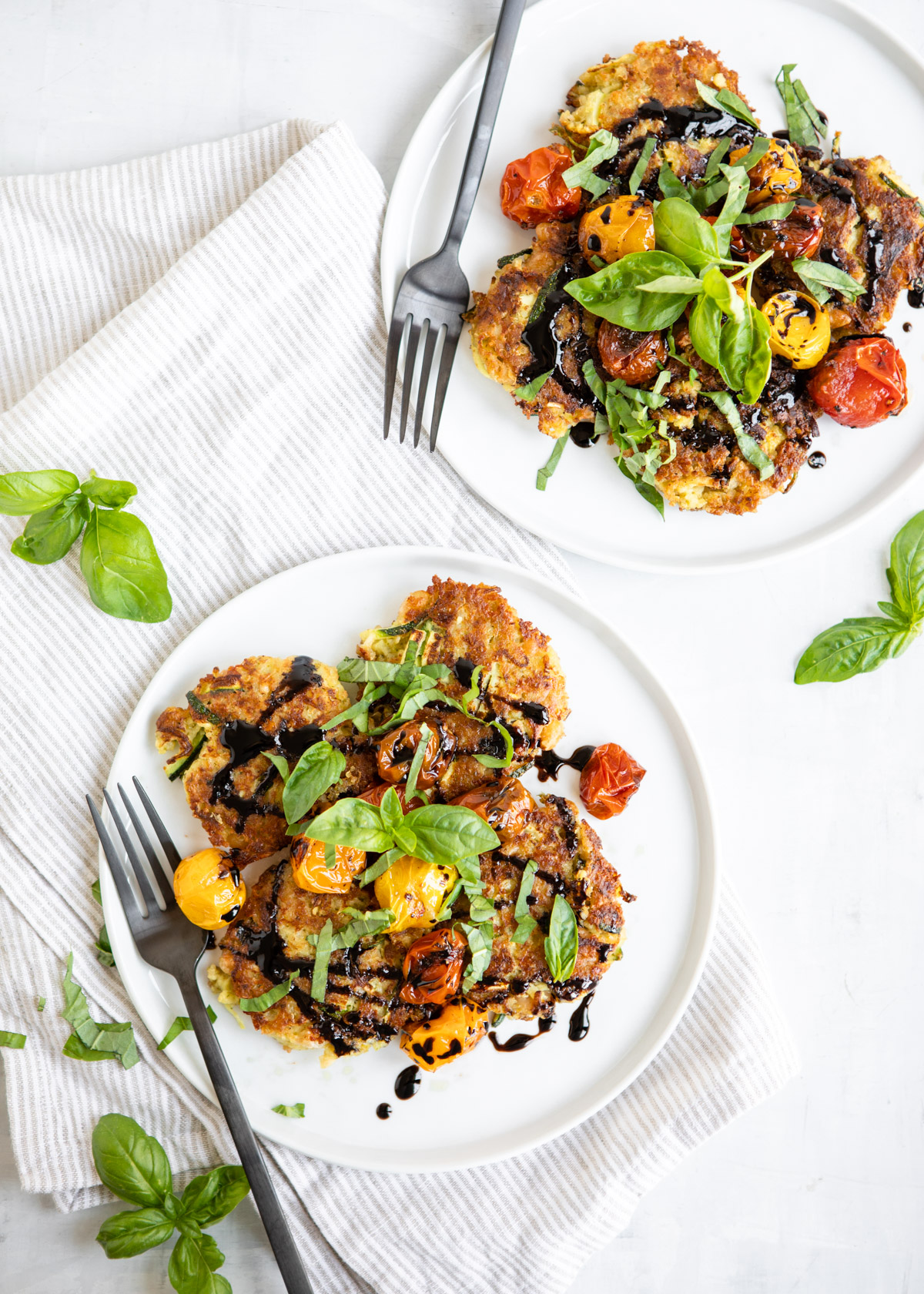 Quinoa White Bean Zucchini Fritters with Burst Cherry Tomatoes